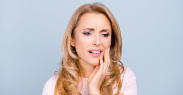 A woman with dental pain