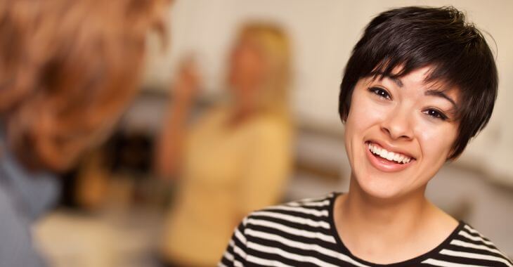 Happily smiling young woman